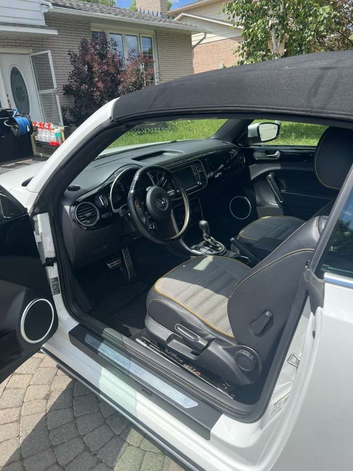 Freshly cleaned interior of a white VW Beetle convertible